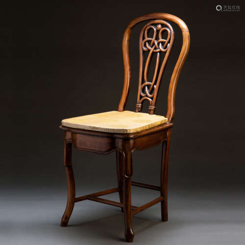 A ROSEWOOD CHAIR