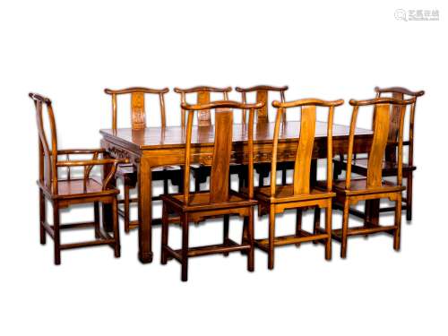 A GROUP OF HARD WOOD DINING TABLE AND CHAIRS