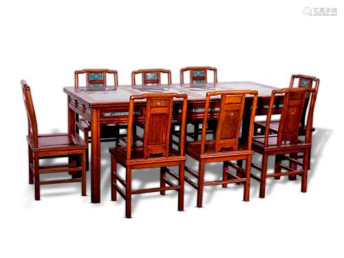 A GROUP OF HARD WOOD DINING TABLE AND CHAIRS