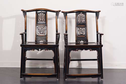 A PAIR OF HARD WOOD ARMCHAIRS