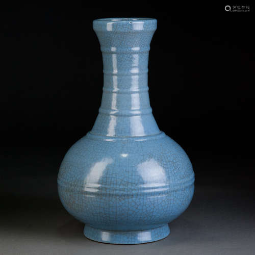 A BLUE GLAZED VASE