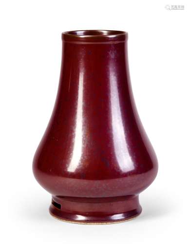 A RUST RED GLAZED VASE