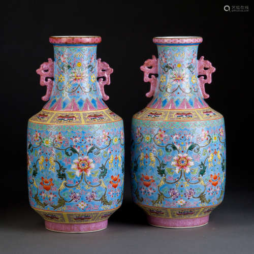 A PAIR OF FAMILLE ROSE VASES WITH FLOWERS