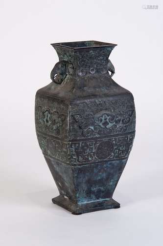 A CARVED COPPER FOUR EDGES VASE