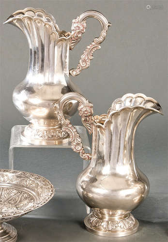 Pair of Peruvian silver jugs punched Law 900.