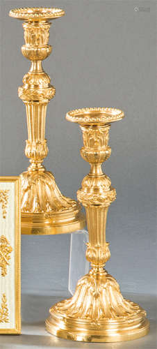 Pair of Louis XVI candlesticks in gilt bronze with…