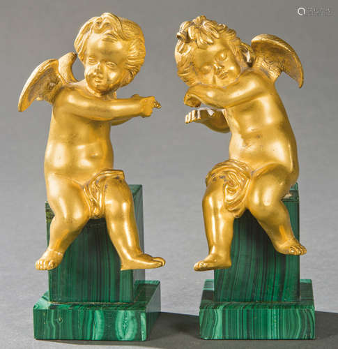 Pair of gilded bronze and malachite, S. XX.