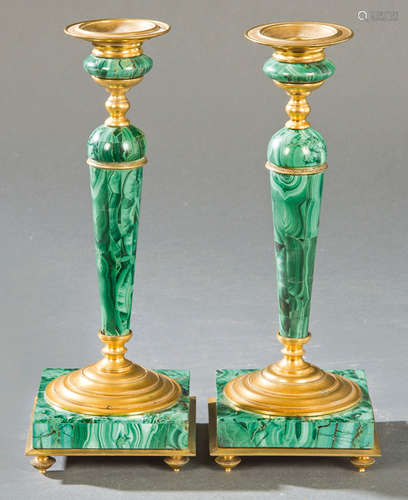 Pair of golden bronze and malachite candlesticks, …