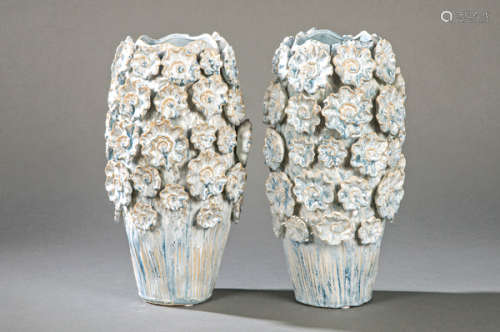 Pair of enameled ceramic vases with embossed flowe…