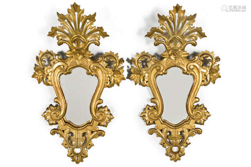 Pair of cornucopias in carved and gilded wood.