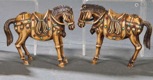 Pair of horses carved in ivory, China first third …