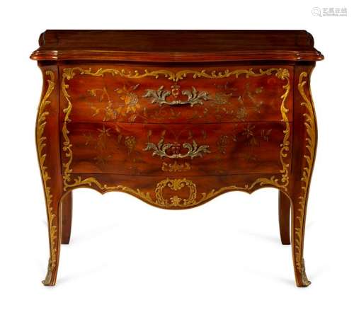 A Louis XV Style Parcel Gilt Bombe Commode