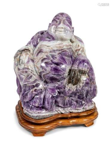 A Large Carved Amethyst Hotei