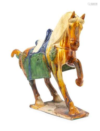 A Chinese Sancai Glazed Pottery Figure of a Horse