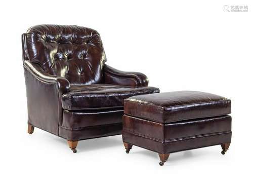 A Leather Upholstered Club Chair and Ottoman