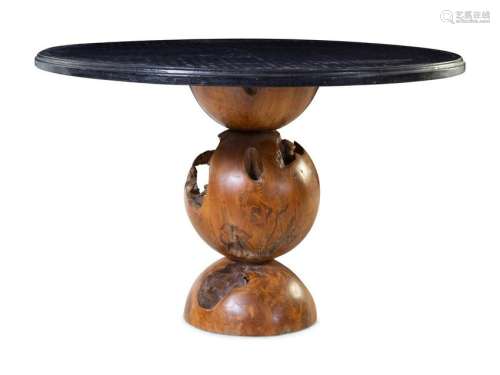 A Contemporary Cast Metal and Burlwood Center Table
