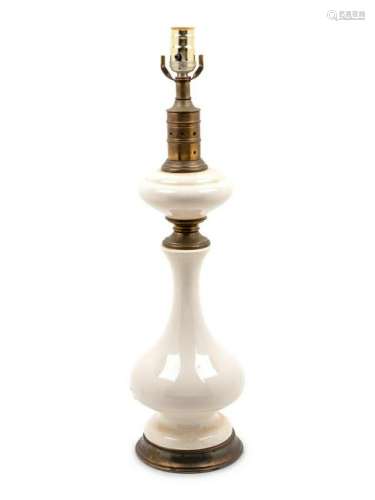 A Porcelain and Brass Table Lamp
