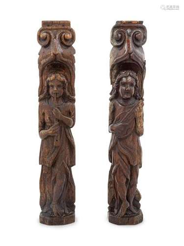 A Pair of Carved Wood Figureheads