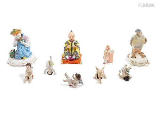 Group of Nine Figural Porcelain Articles