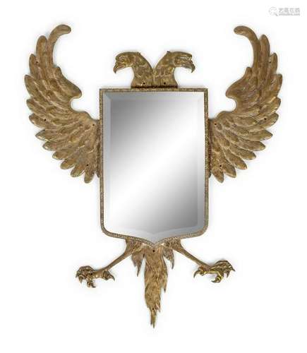 A Continental Pressed Brass Mirror