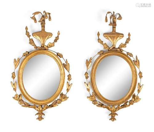 A Pair of Continental Giltwood Mirrors