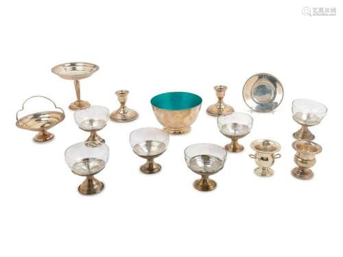 A Group of Fourteen Silver and Silvered Metal Table