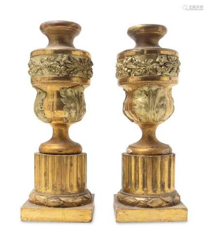 A Pair of Giltwood Candlesticks