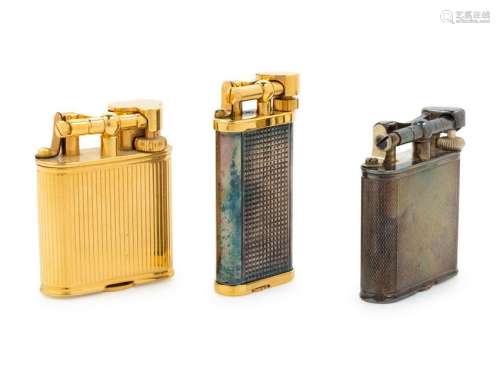 A Group of Three Dunhill Lift-Arm Lighters