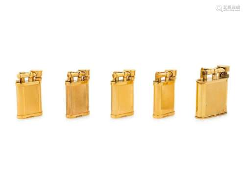 A Group of Five Gilt Metal Dunhill Lift-Arm Lighters