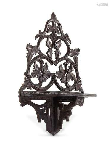 A Victorian Carved Oak Wall Shelf