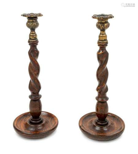 A Pair of English Brass Mounted Turned Oak Candlesticks