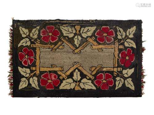 A Flower and Twig Decorated Hooked Rug