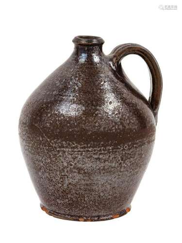 An Alkaline Glazed Earthenware Jug