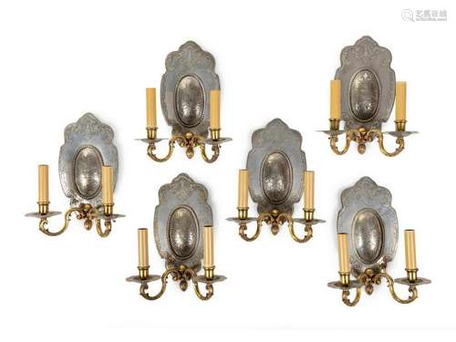 A Set of Six Silvered and Gilt Metal Two-Light Sconces