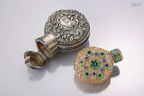 Perfume bottle with silver case