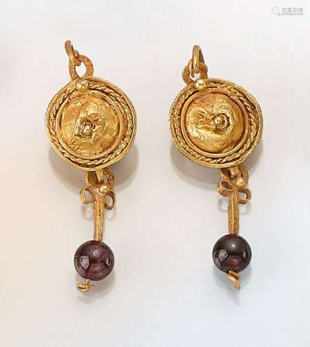 Pair of ear hangers with garnets