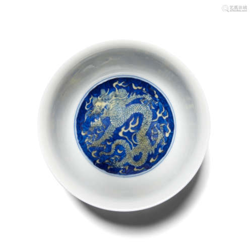 Kangxi six-character mark and of the period An underglaze blue and yellow enameled dragon bowl