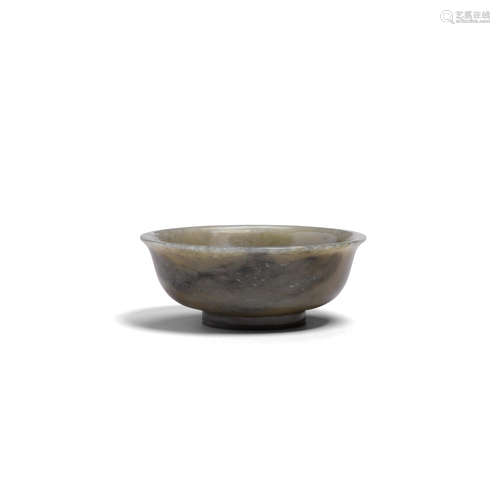 Qianlong mark, 18th/19th century A carved jade footed bowl