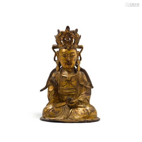 Ming dynasty A gilt bronze figure of a seated bodhisattva