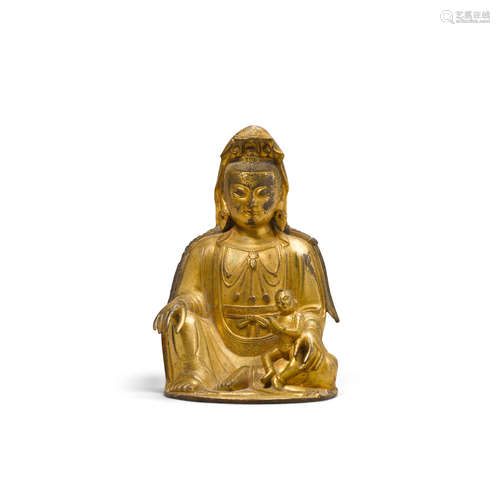 17th/18th century A gilt copper alloy seated figure of the Songzi Guanyin