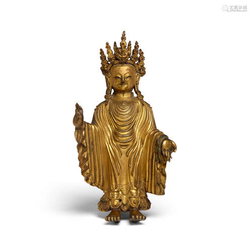 18th/19th century A gilt metal alloy figure of the Dipankara Buddha