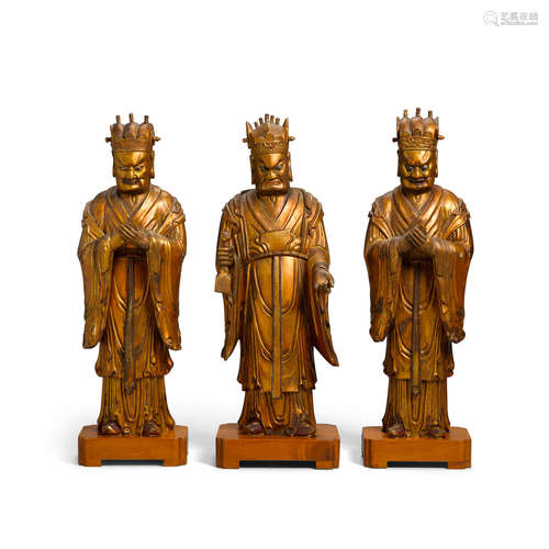 Ming dynasty, 16th century A set of three lacquered Wood Daoist household guardians