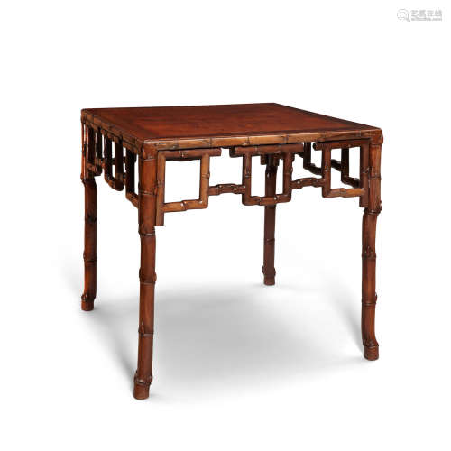 Late Qing/Republic period An elegant hongmu table with burlwood top