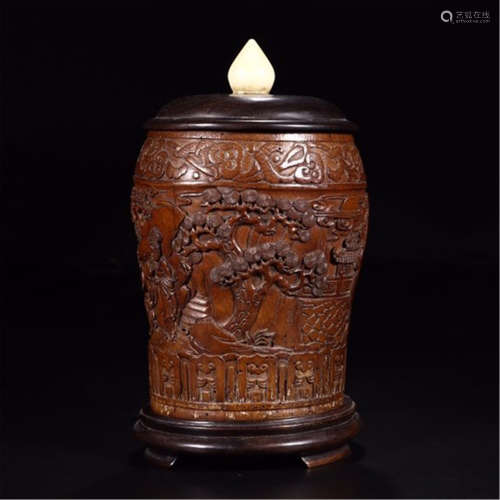 A CHINESE CARVED BAMBOO FIGURE AND STORY LIDDED POT