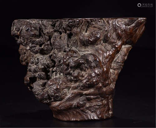 A CHINESE CARVED WOOD BRUSH POT