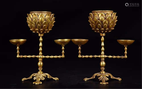 A PAIR OF CHINESE GILT BRONZE LOYUS CANDLE HOLDERS