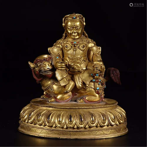 A CHINESE GILT BRONZE SEATED BUDDHA