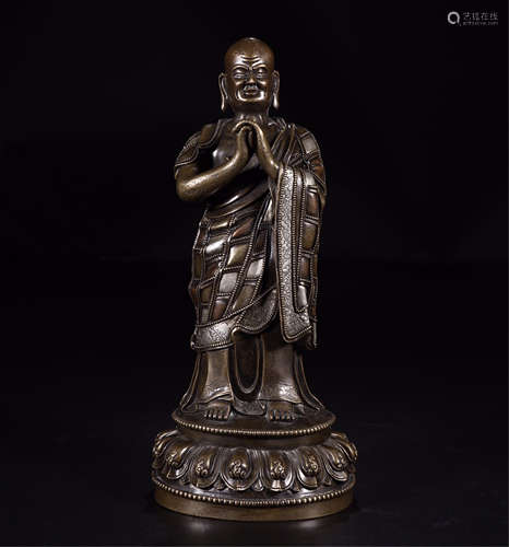 A CHINESE BRONZE SILVER INLAID STANDING LOHAN