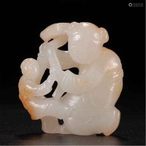 A CHINESE CARVED WHITE JADE BOY TABLE ITEM