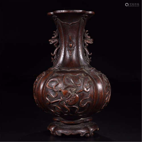 A CHINESE CARVED AGALWOOD MELON VASE
